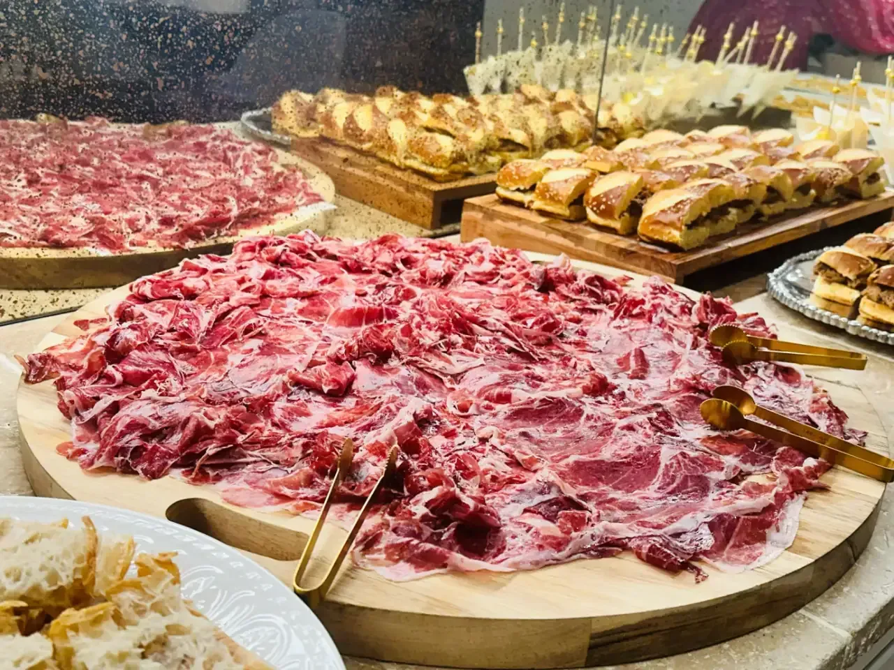 Authentic Spanish tapas spread with seasonal decoration at Houston corporate event